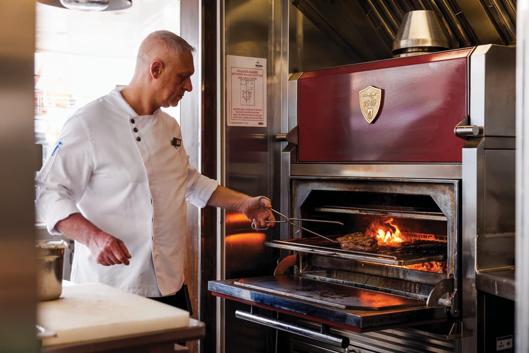 Atlas Ocean Voyages World Traveller 7 Aft Grill Chef ©Atlas Ocean Voyages